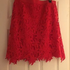 New red flora lace cut skirt.